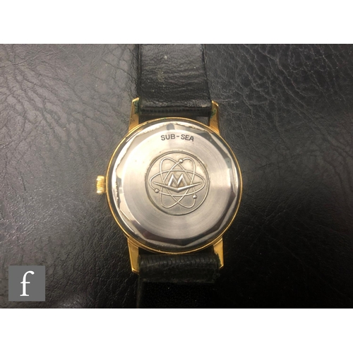 243 - A mid 20th Century gold plated Movado Tempo Matic wristwatch, batons and date facility to a silvered... 