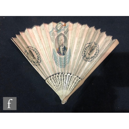 150 - An early 19th Century George III sixteen-stick paper and bone fan decorated in polychrome with a por... 