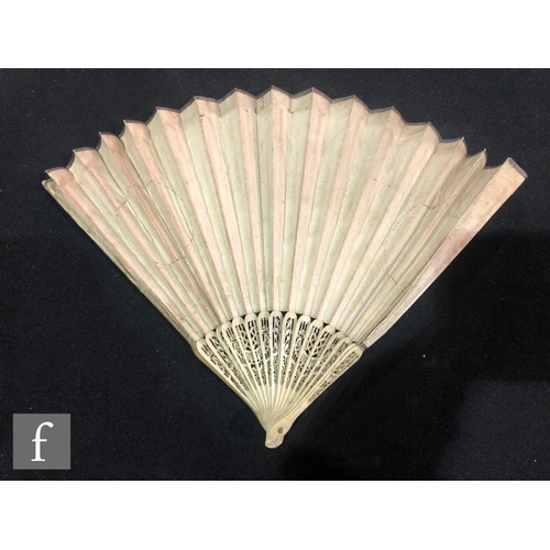 150 - An early 19th Century George III sixteen-stick paper and bone fan decorated in polychrome with a por... 