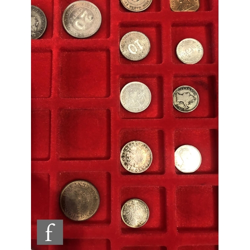 774 - Two trays of coins from Australia, New Zealand and Malaysia to include half crowns, florins, shillin... 