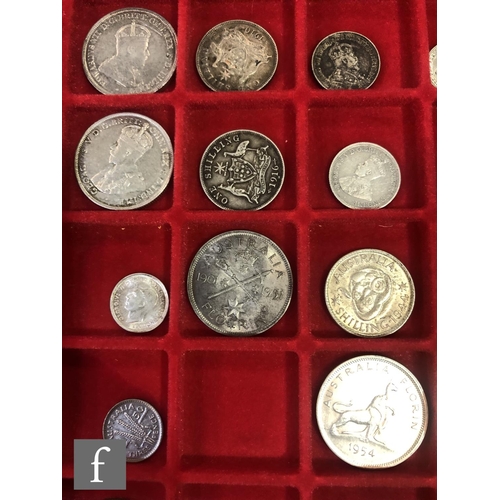 774 - Two trays of coins from Australia, New Zealand and Malaysia to include half crowns, florins, shillin... 