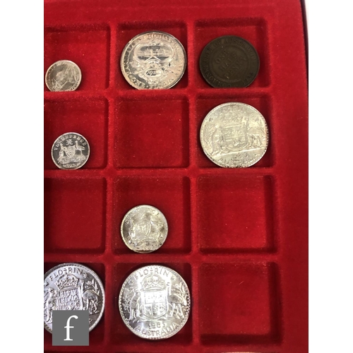 774 - Two trays of coins from Australia, New Zealand and Malaysia to include half crowns, florins, shillin... 