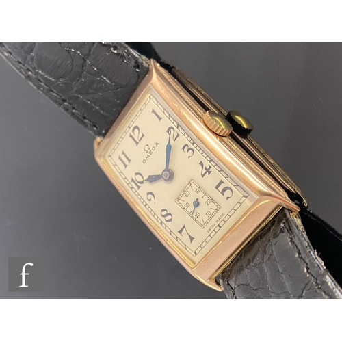 227 - A 9ct hallmarked Gentleman's, manual wind Omega wristwatch, Arabic numerals to a silvered rectangula... 