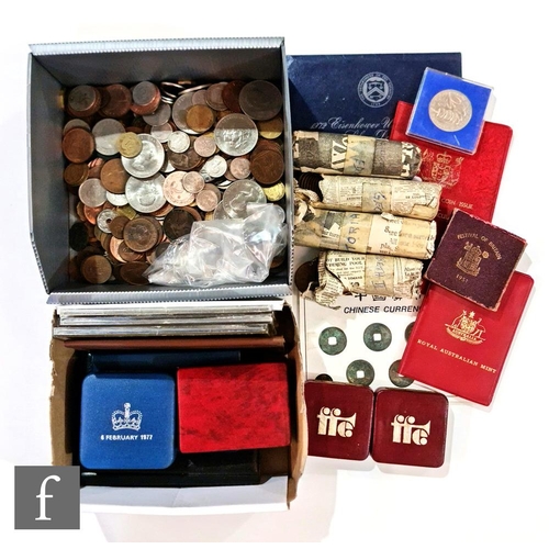 495 - Various Victoria to Elizabeth II florins, shillings and threepences in two small black albums, a Geo... 