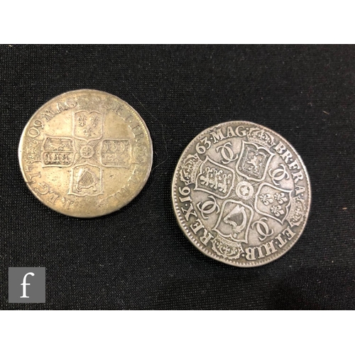 498 - A Charles II to Anne crown 1663 and half crown 1709. (2)