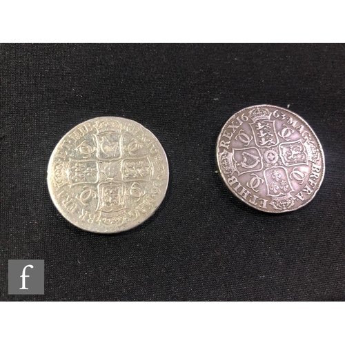 503 - Two Charles II crowns dated 1663 and 1676. (2)