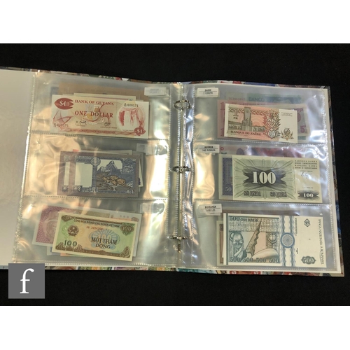 506 - Two albums of European and world bank notes to include Poland, Slovenia, Uzbekistan, Kyrgyzstan, Sou... 