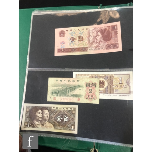 507 - An extensive album of world banknotes to include an American 1857 merchant planters bank for the sta... 