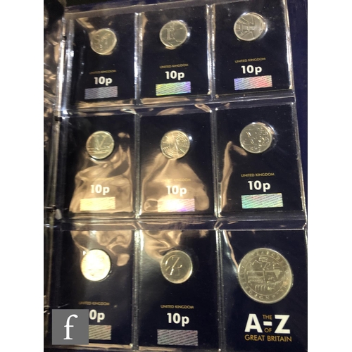 528 - Two Elizabeth II change checker albums of fifty pences to five pound coins including other sets and ... 