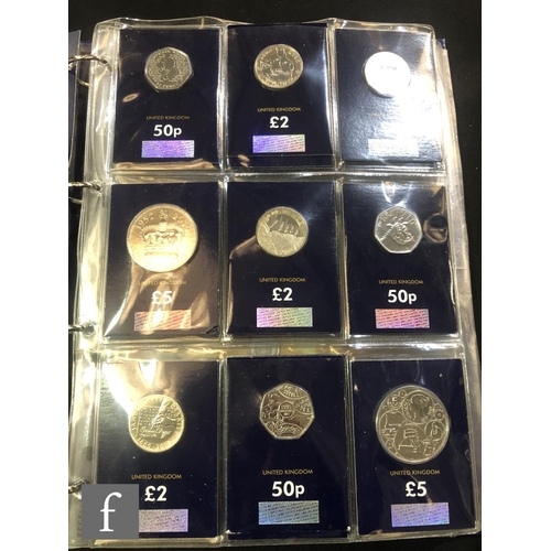 528 - Two Elizabeth II change checker albums of fifty pences to five pound coins including other sets and ... 