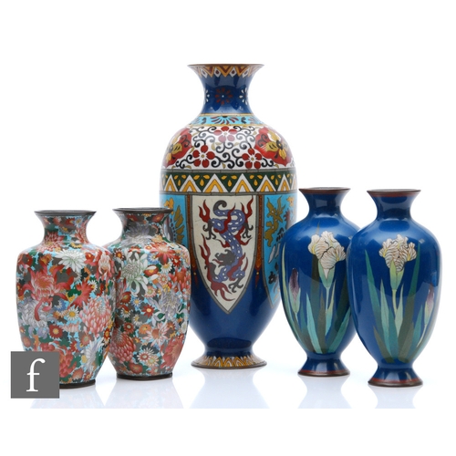 135 - A collection of Japanese Meiji Period (1868-1912) cloisonne vases, to include a pair decorated with ... 