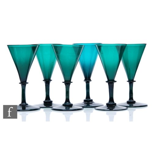 371 - A set of six 19th Century green wine glasses with a conical bowl above bladed knop, plain stem and s... 