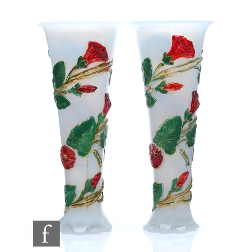 398 - A pair of 19th Century Baccarat opaline vases, petal edged foot rising to a slender flared body with... 