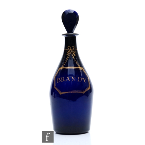 407 - An 18th Century Bristol Blue spirit decanter of Indian Club form with lozenge form stopper, gilded t... 