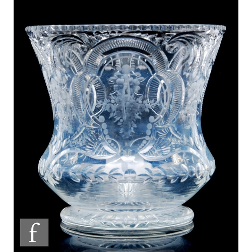 420 - A late Victorian clear crystal glass vase, of footed low shouldered and flared form, decorated with ... 