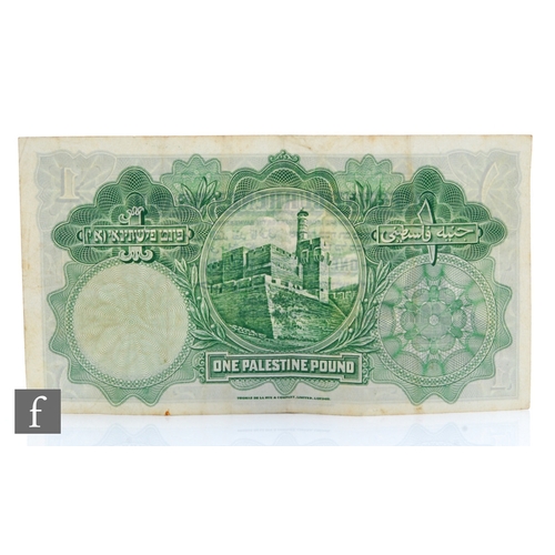 534 - A Palestine Currency Board one pound banknote, serial number K499968, Jerusalem 20th April 1939, pri... 