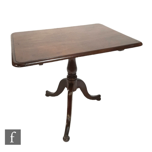 986 - A Victorian mahogany tilt top pedestal table, the rectangular top over a tripod base, height 70cm x ... 