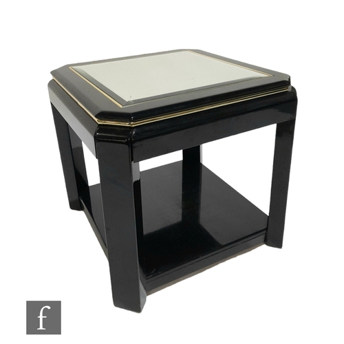 995 - A 20th Century ebonised octagonal occasional table with bevelled glass inset top, on square legs uni... 