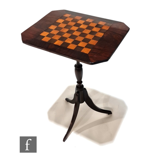 998 - A Victorian occasional games table, the chequer board top over a turned pedestal and splayed tripod ... 