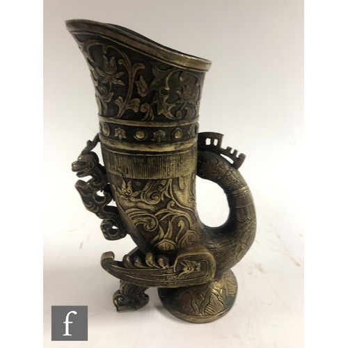 190 - A collection of Asian metalwares, to include a temple bell, a ritual wine vessel, a Qianlong style l... 