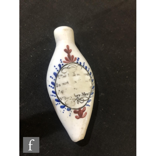 259 - An 18th Century milk glass scent bottle of compressed tear form with a shallow collar neck, hand ena... 