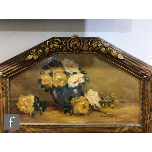 1009 - A 20th Century gilt framed wall mirror, the arch panel painted with a vase and roses within a beaded... 