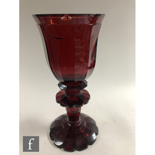 417 - A large 19th Century Bohemian ruby chalice and cover, possibly Moser or Neuwelt, the petal edged and... 