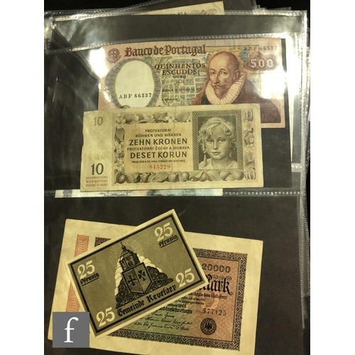 507 - An extensive album of world banknotes to include an American 1857 merchant planters bank for the sta... 