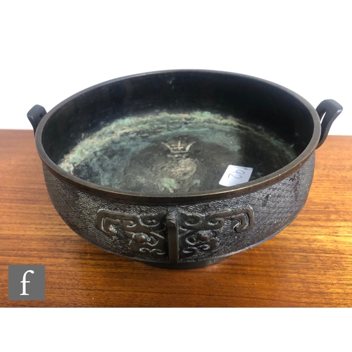 192 - A collection of Asian metalwares, to include a Chinese Archaic style censer, the pedestal vessel wit... 