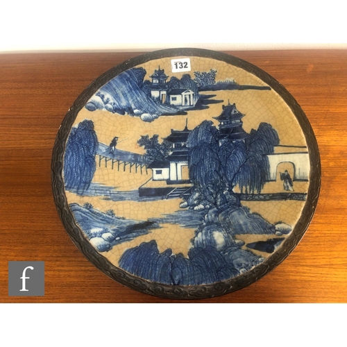 132 - A Chinese late Qing Dynasty (1644-1912) crackle glazed charger, of circular form, the central well p... 