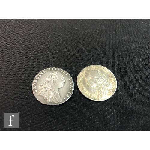 496 - Four Anne to George III coins to include a four pence 1704, a sixpence 1746, a Maundy penny and a si... 