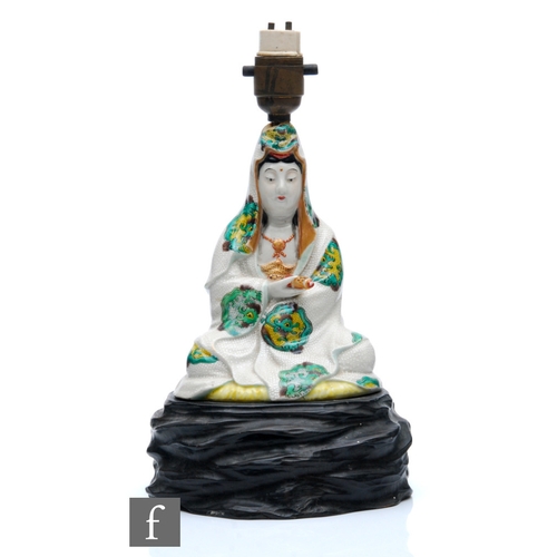 9056 - A Japanese Meiji Period (1868-1912) figure of Kannon, the bodhisattva dressed in robe and modelled i... 