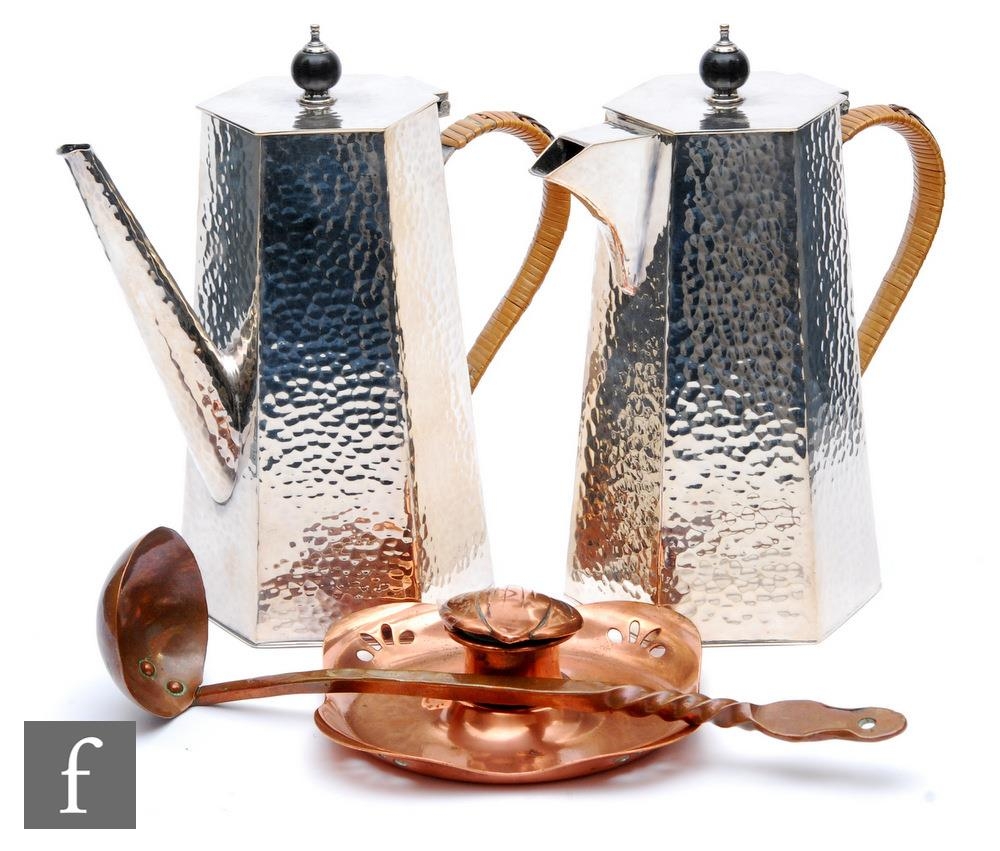 A 20th Century Arts & Crafts silver plated coffee pot and hot water jug