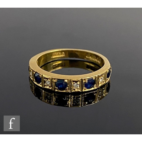 540 - An 18ct hallmarked sapphire and diamond nine stone ring, weight 3.6g, alternating stones to plain sh... 