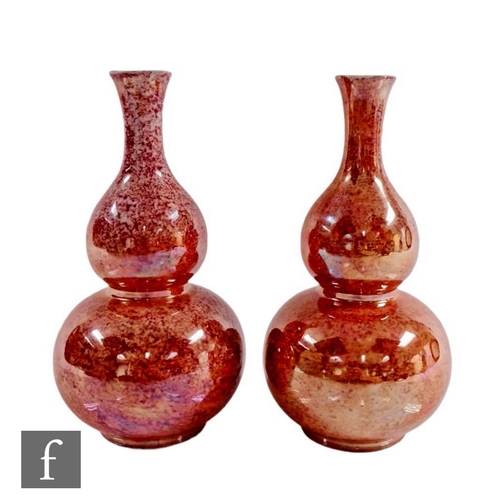 9035 - A pair of 1930s Norfolk Pottery for Lawleys double gourd vases decorated in a sponged orange lustre,... 