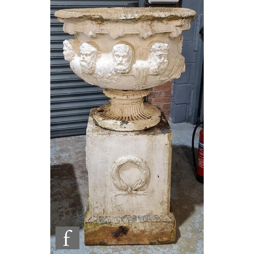 1223 - A large 19th Century terracotta terrace urn in three sections, the gadrooned edged bowl mounted with... 