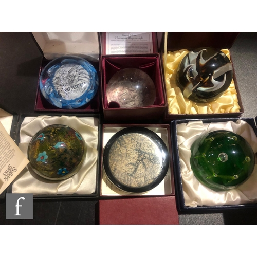 315 - A collection of later 20th Century boxed decorative paperweights to include three Caithness examples... 