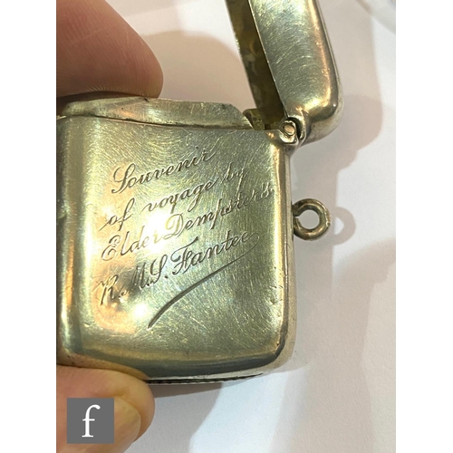 406 - A hallmarked silver vesta case with enamelled flag to front and presentation engraving to reverse, S... 