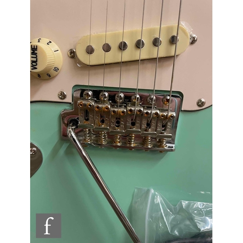 5084 - A Jet JS300 Left handed guitar, Green, sold as new in box with cabling, some light corrosion to the ... 