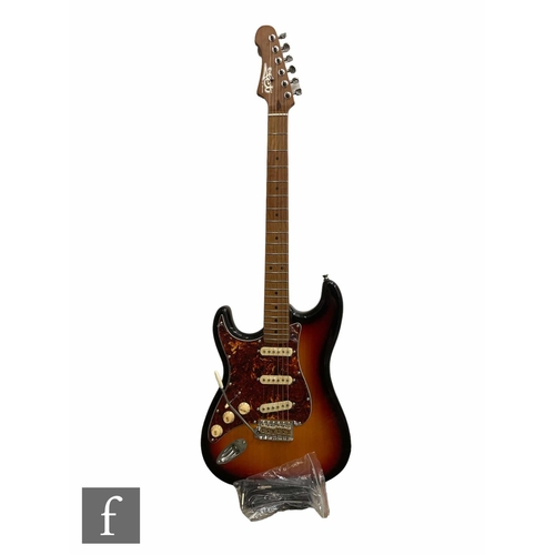 5085 - A Jet JS300 Left handed guitar, Sunburst, sold as new in box with cabling, some light corrosion to t... 