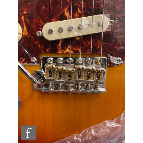 5085 - A Jet JS300 Left handed guitar, Sunburst, sold as new in box with cabling, some light corrosion to t... 