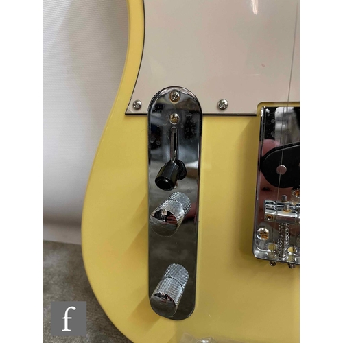 5086 - A Jet JT300 Left handed guitar, Yellow, sold as new in box cabling, some light corrosion to the meta... 