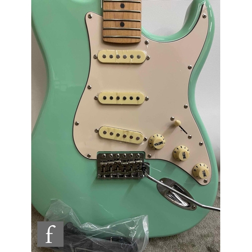 5087 - A Jet JS300 Right handed guitar, Mint Green, sold as new in box with cabling, some very light corros... 