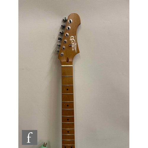 5088 - A Jet JT300 Right Handed guitar, Orange, sold as new in box with cabling, some light corrosion to th... 