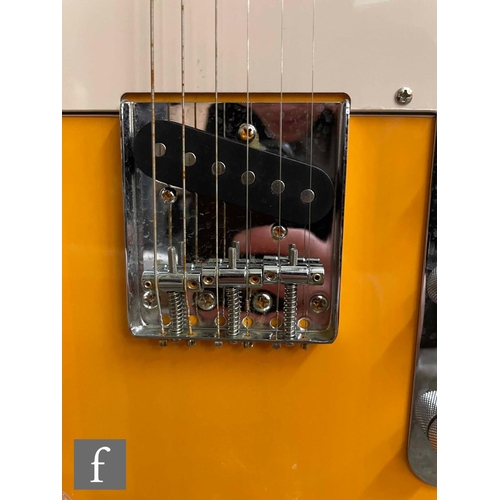 5088 - A Jet JT300 Right Handed guitar, Orange, sold as new in box with cabling, some light corrosion to th... 