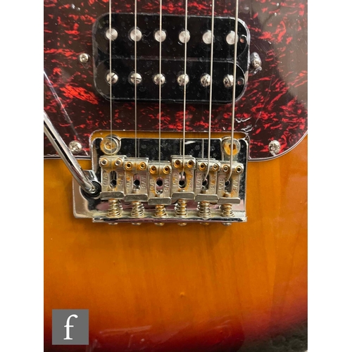 5089 - A Jet JS400 Left handed guitar, Sunburst, sold as new in box with cabling, some light corrosion to t... 