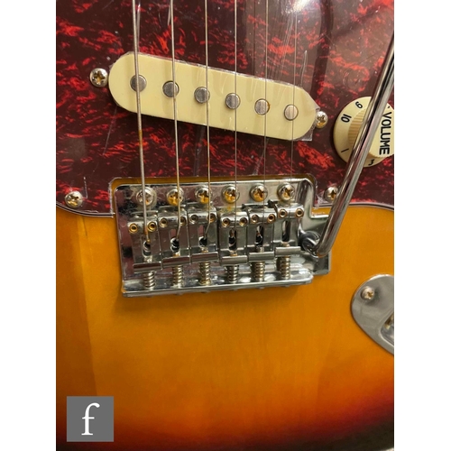 5091 - A Jet JS300 Right handed guitar, Sunburst, sold as new in box with cabling, some very light corrosio... 