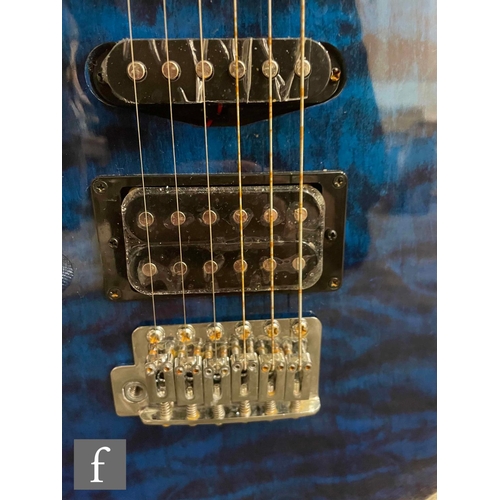 5095 - An Ibanez GRX70QAL -TBB Left Handed guitar, Blue, Serial Number 5N220302372, sold as new in box with... 