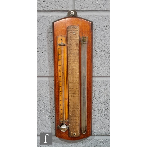 9165 - An early 20th Century mahogany wall barometer mounted with thermometer and tube with central Storm i... 