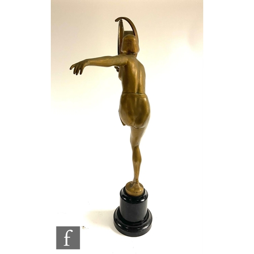 543 - Unknown - A 1930s Art Deco gilt metal model of a scantily clad female dancer with bobbed hair and st... 